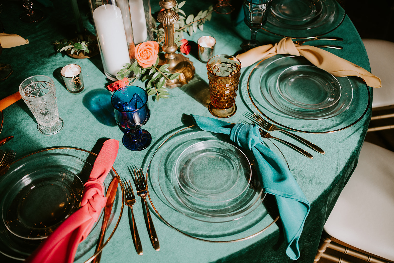 teal tablecloth with color napkins
